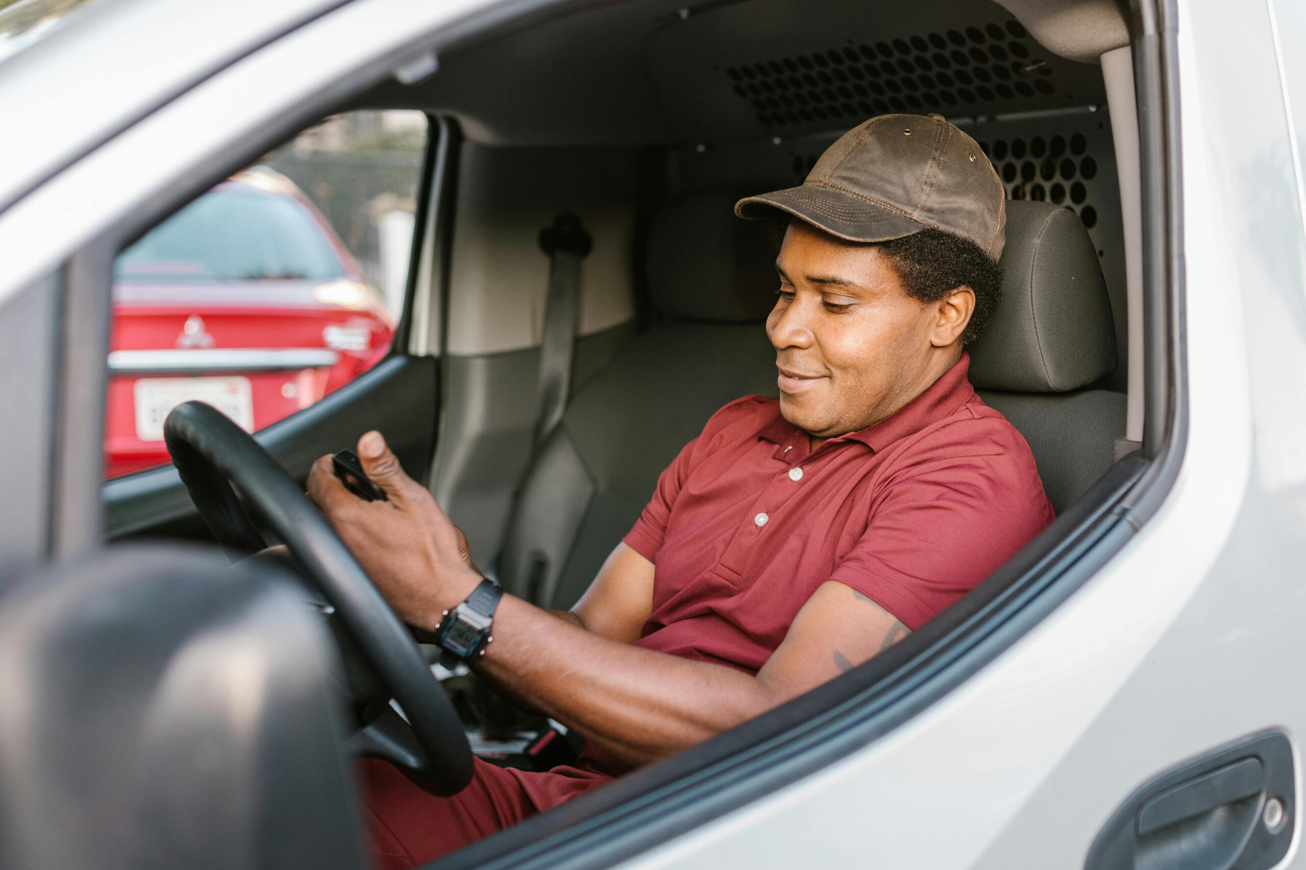 Courier in van